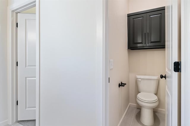 13325 SW 8th St, Yukon, OK 73099 - bathroom with toilet and baseboards