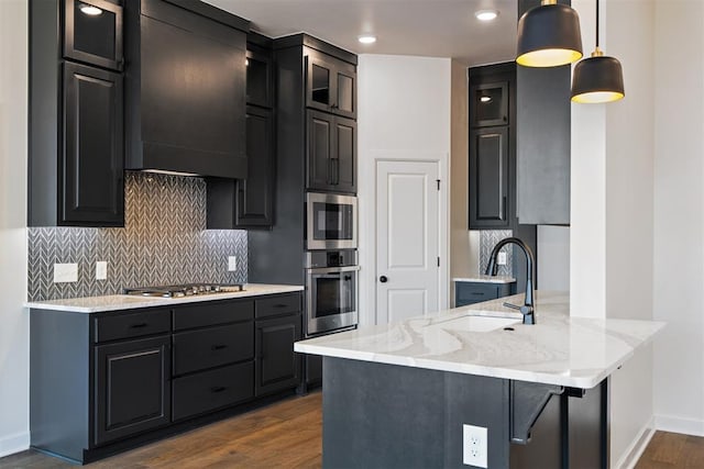 13325 SW 8th St, Yukon, OK 73099 - kitchen featuring backsplash, a peninsula, baseboards, and a sink