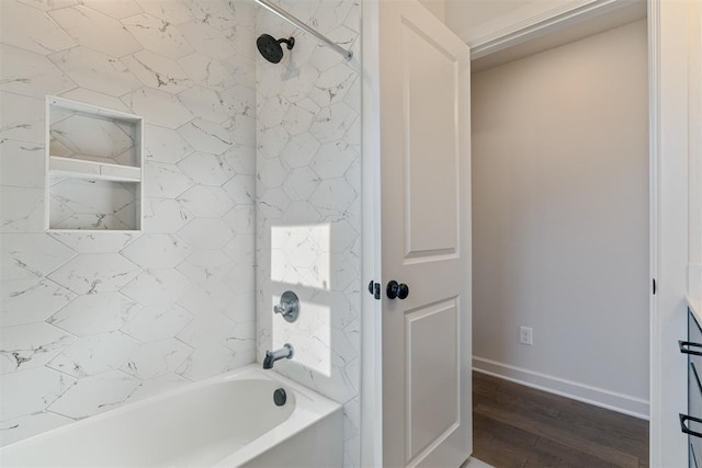 13325 SW 8th St, Yukon, OK 73099 - bathroom featuring baseboards, shower / bathing tub combination, and wood finished floors