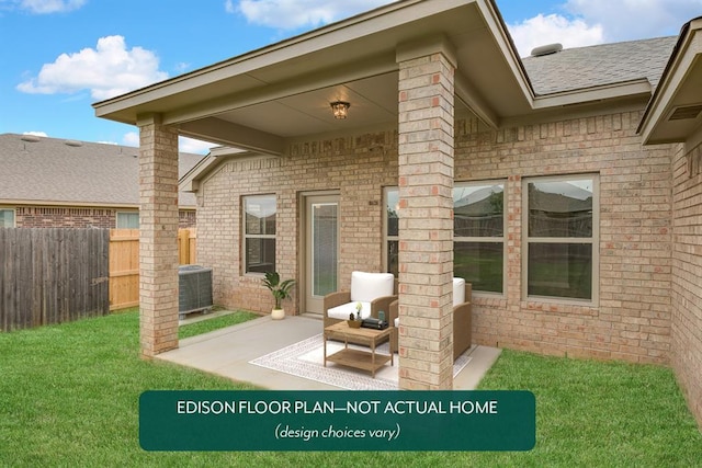 exterior space featuring a yard, central AC unit, and a patio area