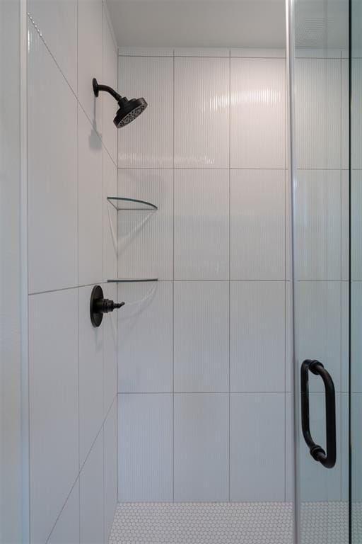 interior details with a shower stall