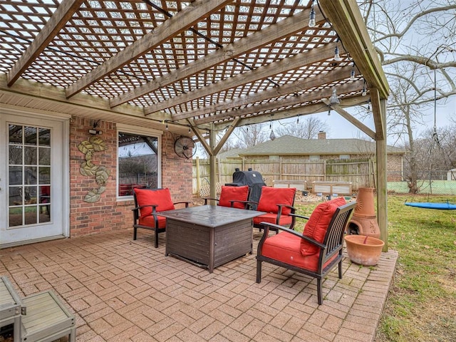 view of patio / terrace featuring grilling area and a pergola