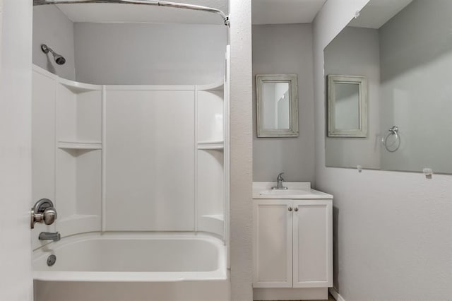 bathroom with vanity and bathing tub / shower combination