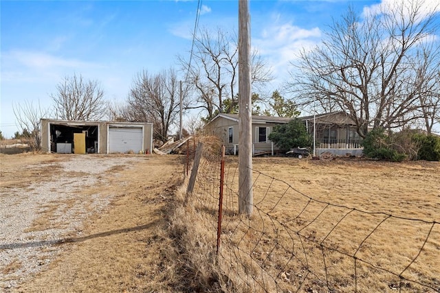 view of yard with a garage