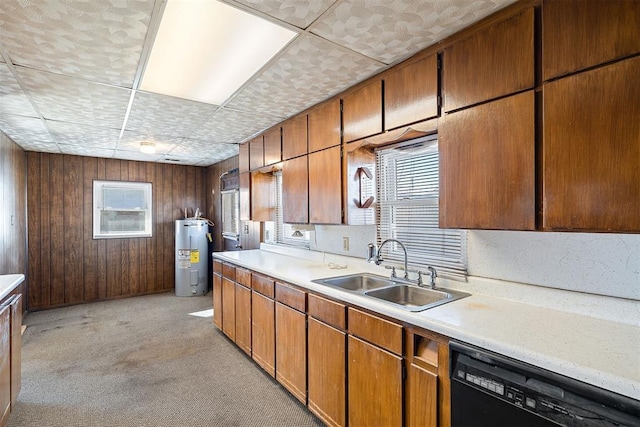 kitchen with wooden walls, black dishwasher, sink, light colored carpet, and electric water heater