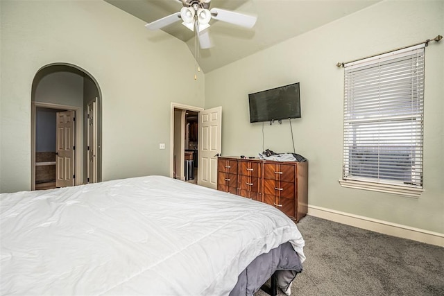 bedroom featuring lofted ceiling, carpet floors, ceiling fan, and ensuite bathroom