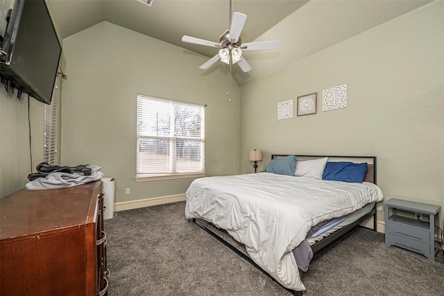 bedroom with lofted ceiling, dark carpet, and ceiling fan