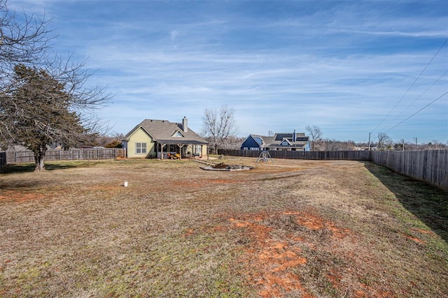 view of yard featuring a fenced backyard