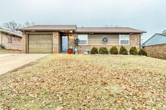 single story home with a garage and a front lawn