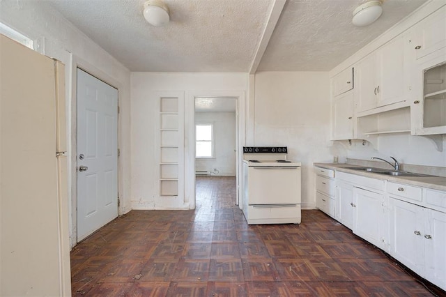 1801 E Madison St, Oklahoma City, OK 73111 - kitchen with sink, white appliances, white cabinets, and dark parquet floors