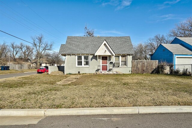 1801 E Madison St, Oklahoma City, OK 73111 - bungalow with a front lawn and a garage