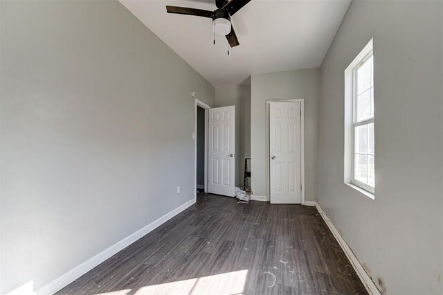 1801 E Madison St, Oklahoma City, OK 73111 - unfurnished bedroom featuring dark hardwood / wood-style flooring and ceiling fan