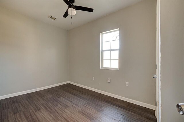 1801 E Madison St, Oklahoma City, OK 73111 - empty room featuring ceiling fan and dark hardwood / wood-style floors