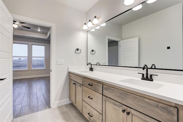 bathroom featuring vanity and ceiling fan