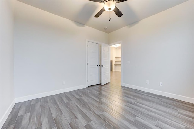 interior space with ceiling fan and light wood-type flooring