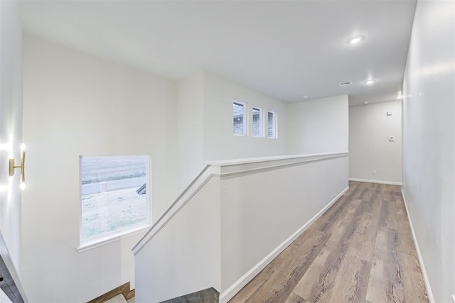 hall with light wood-type flooring