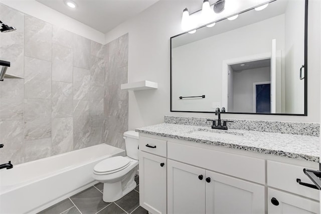 full bathroom with tiled shower / bath combo, vanity, tile patterned floors, and toilet