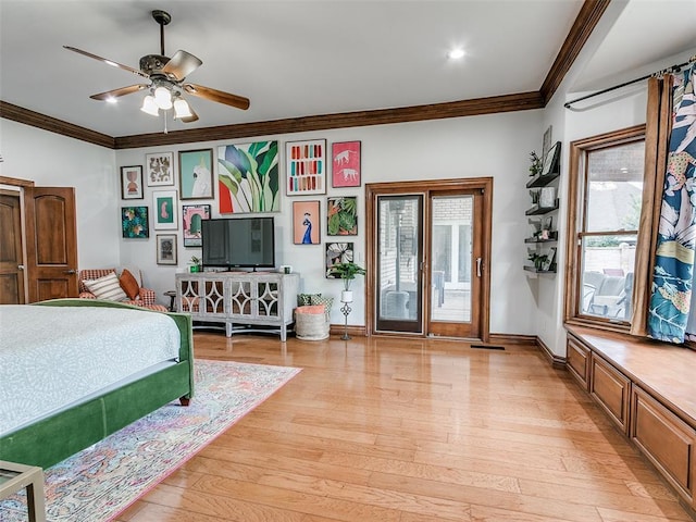 bedroom with multiple windows, light hardwood / wood-style flooring, and ornamental molding