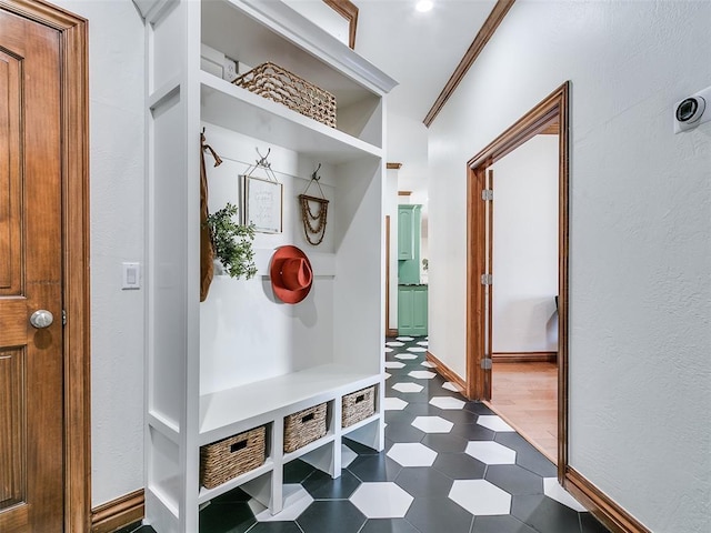 mudroom with ornamental molding