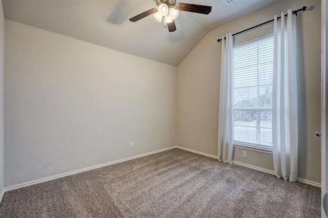 additional living space with vaulted ceiling, light carpet, and ceiling fan