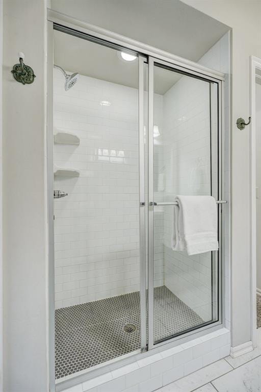 bathroom featuring walk in shower