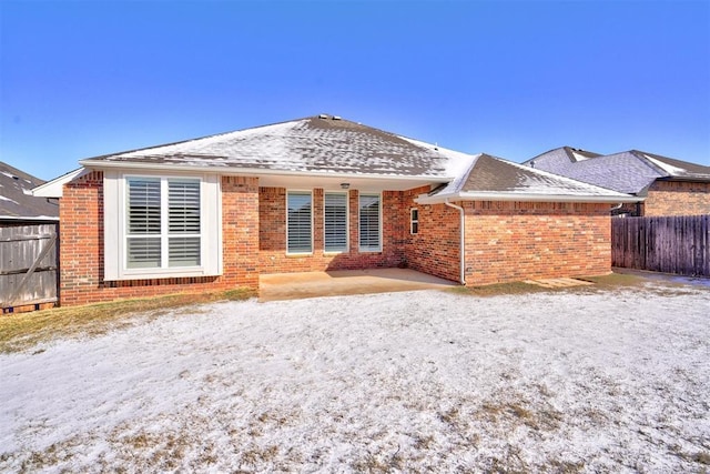 rear view of house featuring a patio