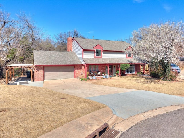 country-style home featuring a front yard, driveway, a chimney, a shingled roof, and a garage