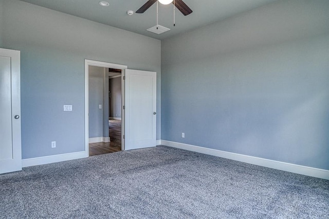 unfurnished bedroom with carpet flooring and ceiling fan