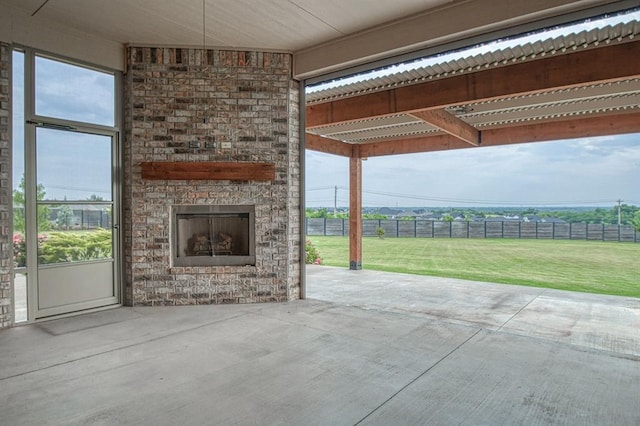 view of patio / terrace with an outdoor brick fireplace