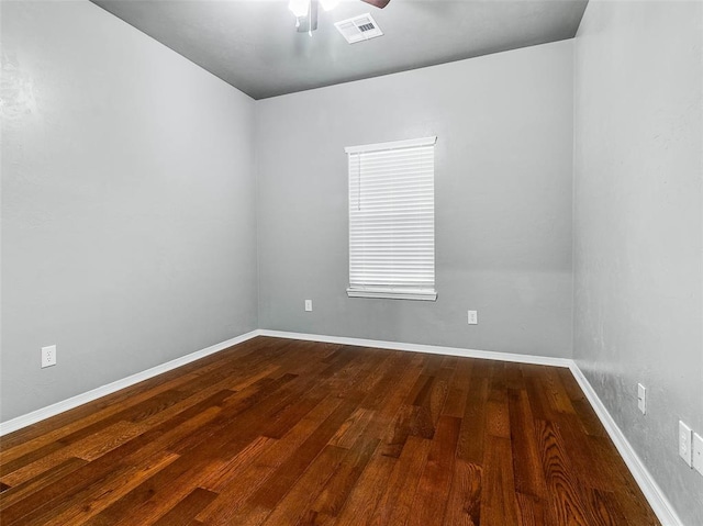 unfurnished room with hardwood / wood-style floors and ceiling fan