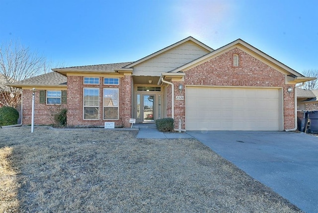 view of front of property featuring a garage