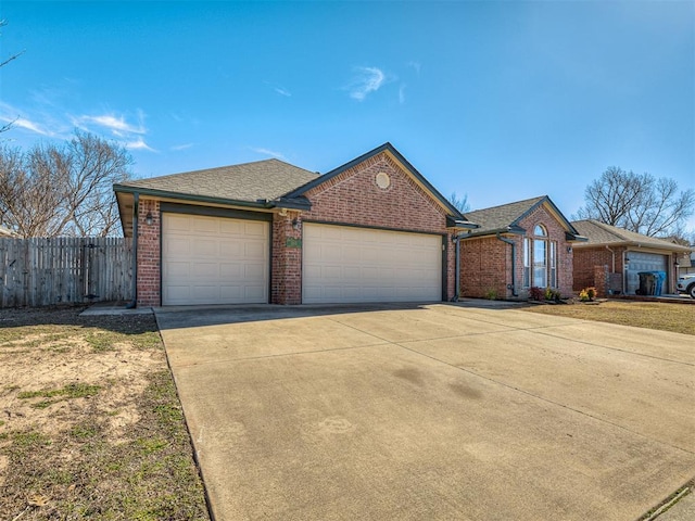 ranch-style home featuring a garage