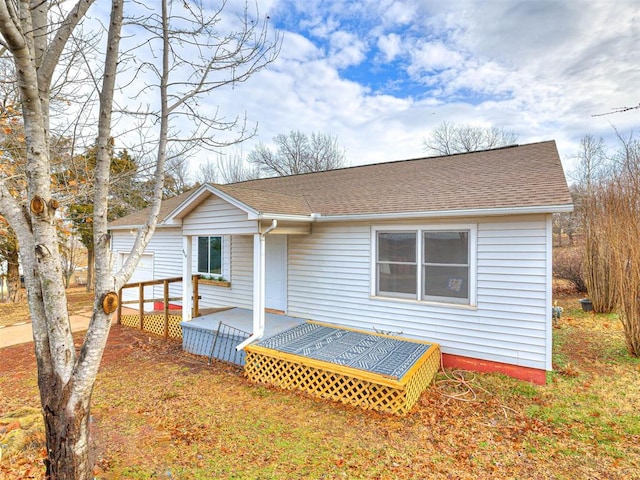 view of front of property featuring a deck