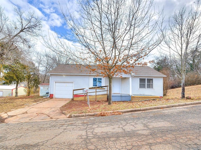 single story home with a garage