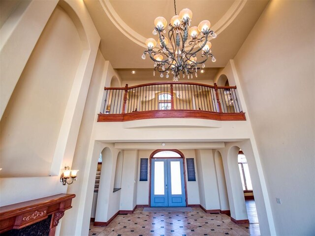 7 Country Club Rd, Shawnee, OK 74801 - entryway featuring french doors, a tray ceiling, and a high ceiling