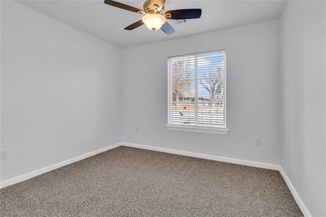 carpeted empty room with ceiling fan