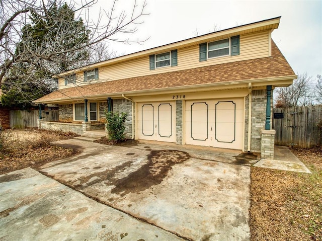 view of front of property featuring a garage