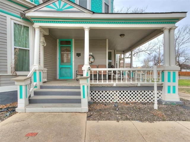 property entrance featuring a porch