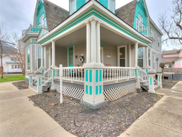 506 S Evans Ave, El Reno, OK 73036 - view of front facade featuring a porch