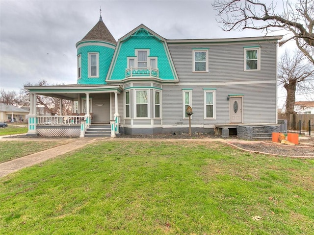 506 S Evans Ave, El Reno, OK 73036 - view of front facade featuring a front yard and a porch