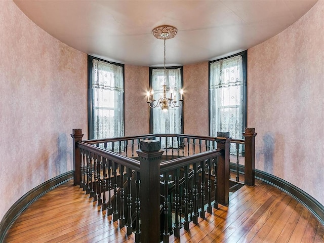 506 S Evans Ave, El Reno, OK 73036 - dining room featuring an inviting chandelier and hardwood / wood-style flooring