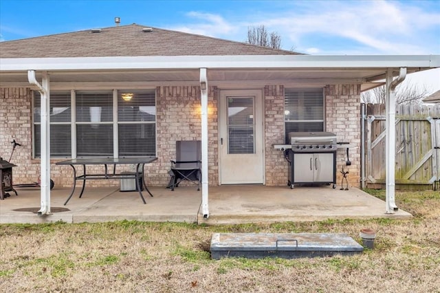 back of house with a patio