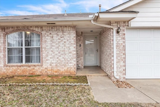 entrance to property with a garage