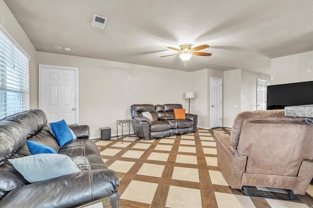 living room with ceiling fan