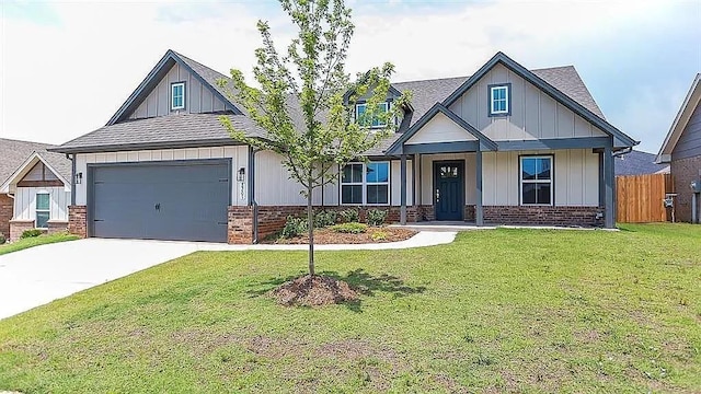 craftsman-style home with a garage and a front yard