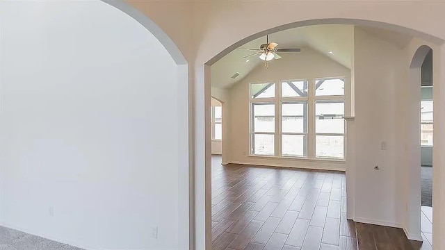 interior space with lofted ceiling and dark hardwood / wood-style floors