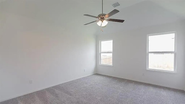 carpeted empty room with ceiling fan