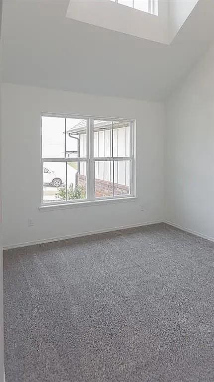 empty room featuring a wealth of natural light