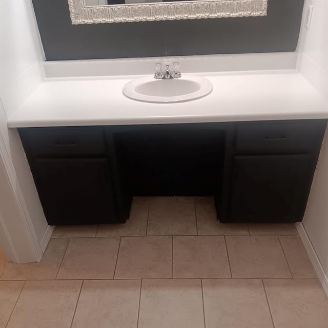 bathroom featuring vanity and tile patterned flooring