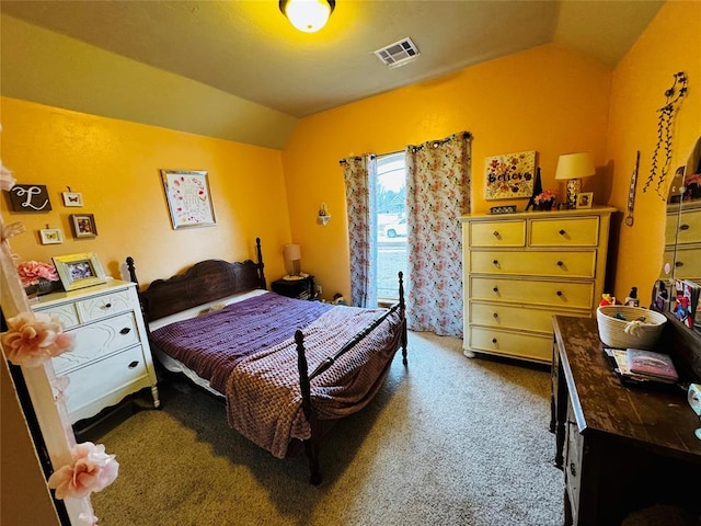 carpeted bedroom featuring lofted ceiling